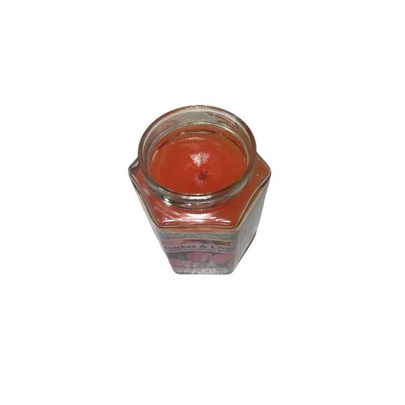 Home Interiors & Gifts jar candles.The scent are Peaches &CreamWoodland candles - Picture 3 of 5